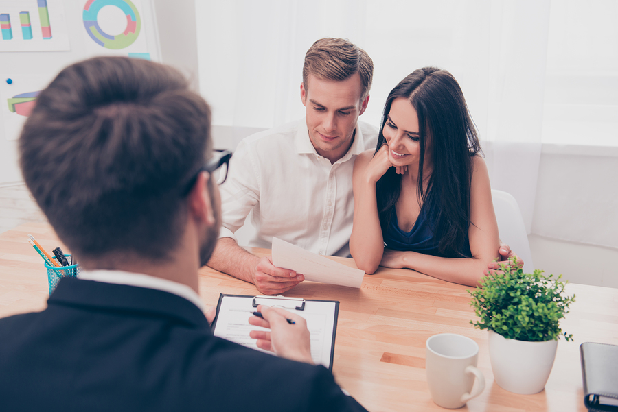 Couple with real estate agent