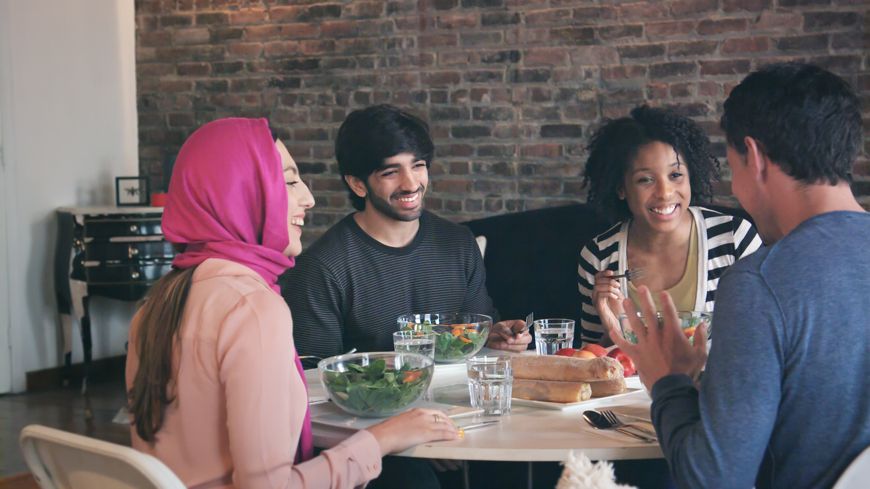 mixed cultures dining together