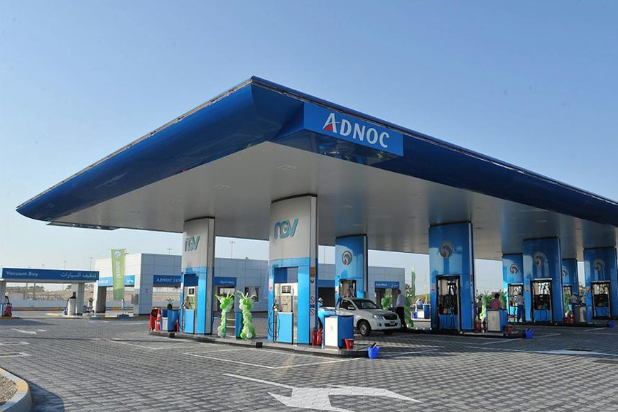 Filling own petrol tank in Abu Dhabi Filling own petrol tank in Abu Dhabi