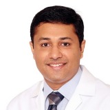 Dr. George John Dr. George John