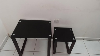 Nested  elegant glass table set of 2